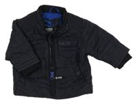 Tmavomodrá šusťáková prošívaná zateplená bunda s kapsami Next