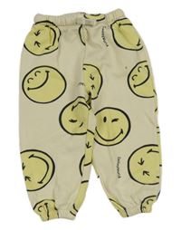 Světležluté tepláky se smajlíky H&M