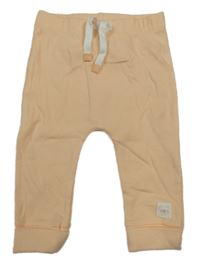 Meruňkové žebrované turecké tepláky s medvídkem George