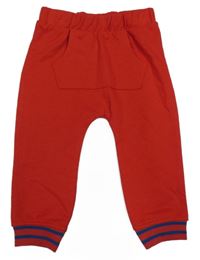 Červené tepláky Tu