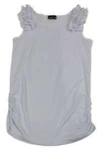 Bílý top s volánky 