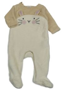 Krémovo-béžový chlupatý overal s králíkem Next