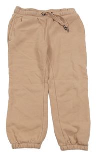 Starorůžové tepláky s nápisem Topolino