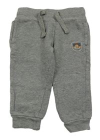 Šedé melírované tepláky s nášivkou Pocopiano