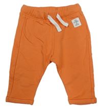 Oranžové tepláky s nášivkou M&S