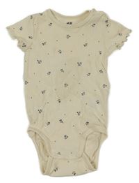 Smetanové žebrované body s květinami H&M