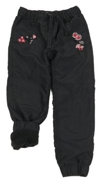 Tmavošedé šusťákové podšité kalhoty s kytičkami Topolino