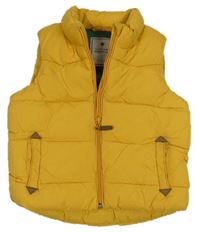 Žlutá šusťáková zateplená vesta Next