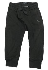 Tmavošedé tepláky s výšivkou Next