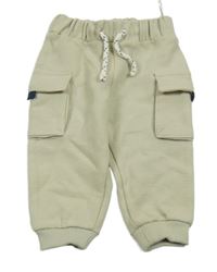 Béžové žebrované tepláky s kapsami C&A