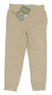 Nové - Béžové tepláky s hvězdami H&M