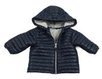 Tmavomodrá prošívaná šusťáková zateplená bunda s kapucí Next