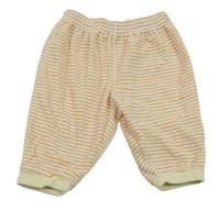 Bílo-oranžové pruhované sametové tepláky 