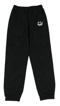 Černé šusťákové cuff kalhoty s kapsami a smajlíkem
