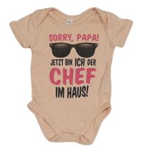 Růžové body s nápisem a brýlemi