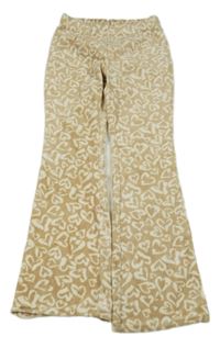 Béžovo-smetanové plyšové flare legíny se srdíčky Y.F.K.