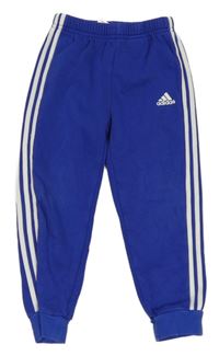 Kobaltově modré tepláky s logem Adidas