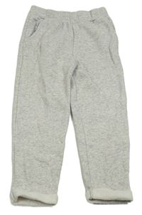 Světlešedé melírované tepláky zn. Disney