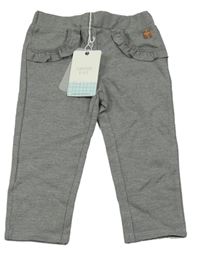 Nové - Šedé tregíny s volánky 