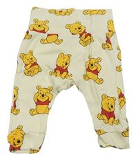 Smetanové turecké tepláky s Pú H&M