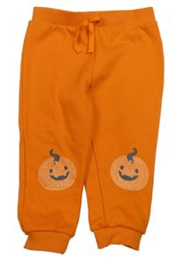 Oranžové teplé tepláky s dýněmi 