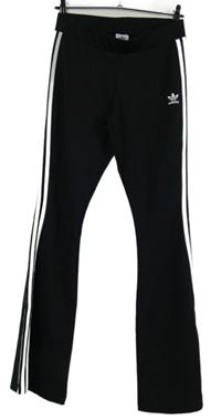 Dámské černé sportovní teplákové zvonové kahoty s pruhy Adidas 