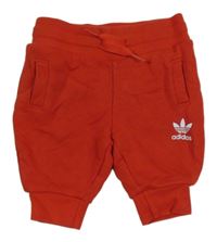 Červené cuff tepláky s logem Adidas 