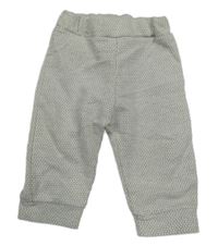 Smetanovo-šedé vzorované teplákové kalhoty se třpytkami