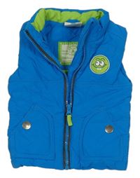 Modrá šusťáková zateplená vesta s nášivkou Topomini