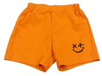 Oranžové sportovní kraťasy se smajlíkem