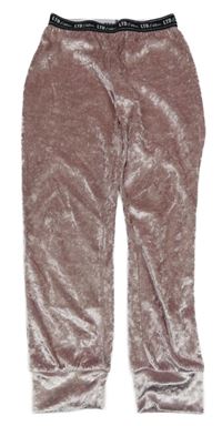 Světlerůžové sametové tepláky s nápisy v pase Matalan