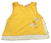 Žluto-smetanová tepláková tunika s květy 
