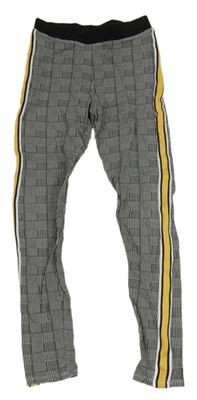 Černo-bílo-žluté kostkované legíny H&M