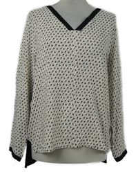 Dámská bílo-černá halenka se vzorem Diversi