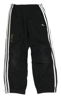 Černé šusťákové kalhoty s pruhy Adidas