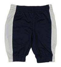 Tmavomodro-bílé sportovní tepláky Puma