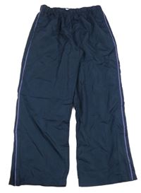 Tmavomodré šusťákové podšité kalhoty 