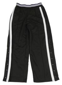 Nové - Černé sportovní široké tepláky s pruhem a cvoky Next