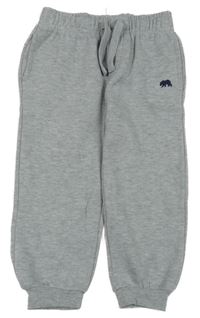 Šedé melírované tepláky s výšivkou Rebel