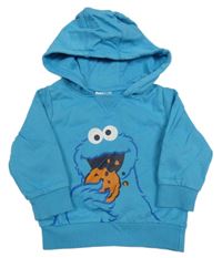 Světlemodrá mikina s příšerkou a kapucí 