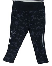 Dámské černo-tmavomodré vzorované sportovní capri legíny Decathlon 