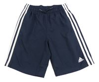 Tmavomodré šusťákové sportovní funkční kraťasy s pruhy Adidas 
