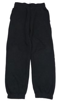 Černé tepláky Decathlon