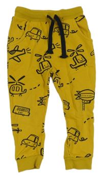 Okrové tepláky s dopravními prostředky Tu