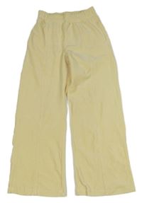 Vanilkové plyšové tepláky Lindex 