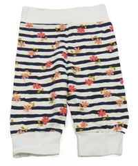 Bílo-tmavomodré pruhované květované tepláky 