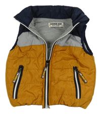 Okrovo-tmavomodro-šedá šusťáková prošívaná zateplená vesta 