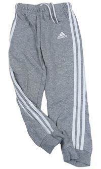 Šedé tepláky s pruhy a logem Adidas