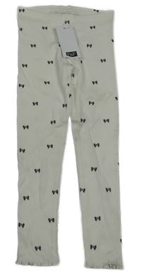 Nové - Bílé žebrované legíny s mašlemi F&F