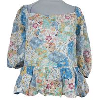 Dámská barevná vzorovaná peplum halenka River Island 
